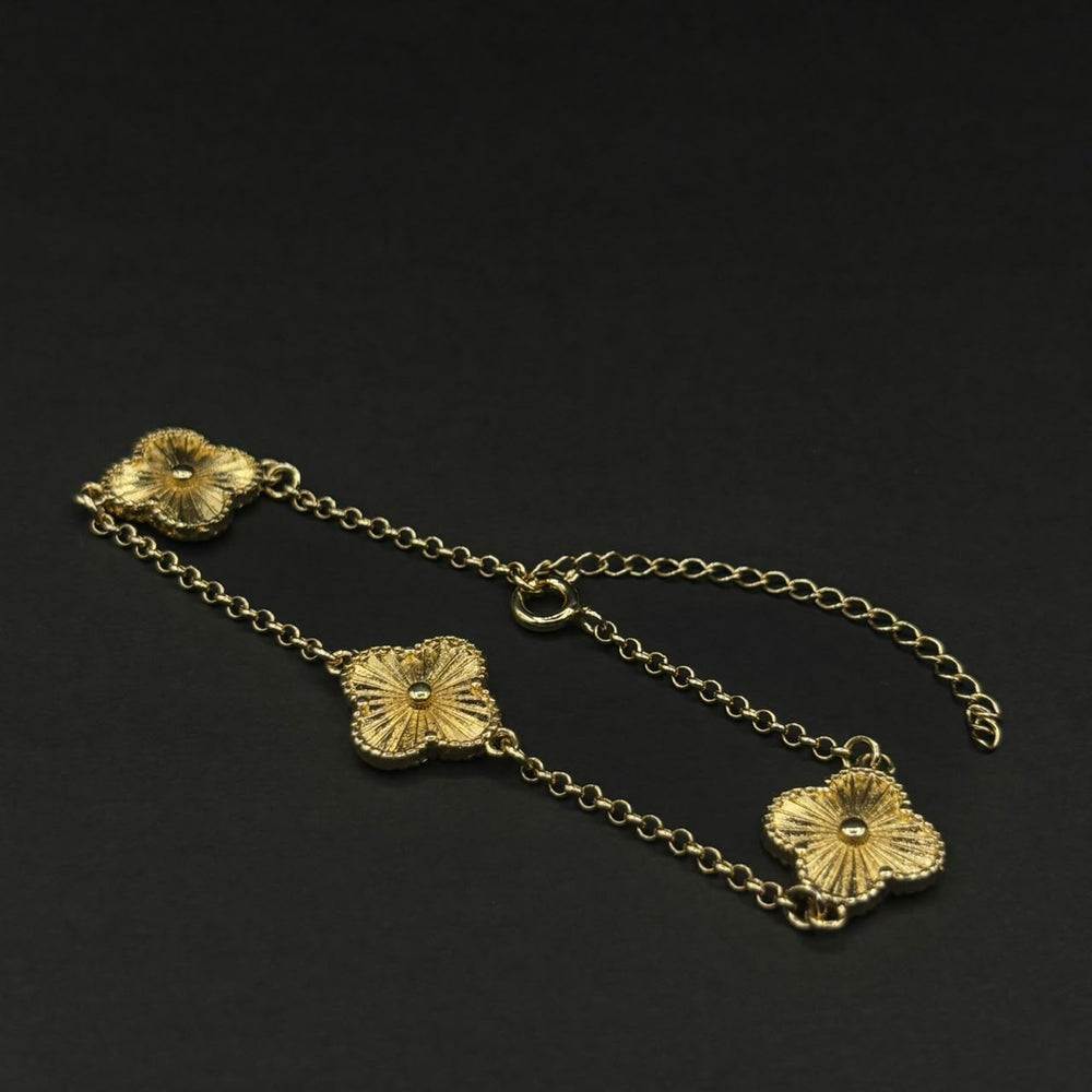 Pulsera Trébol Dorado Texturizado · Oro laminado