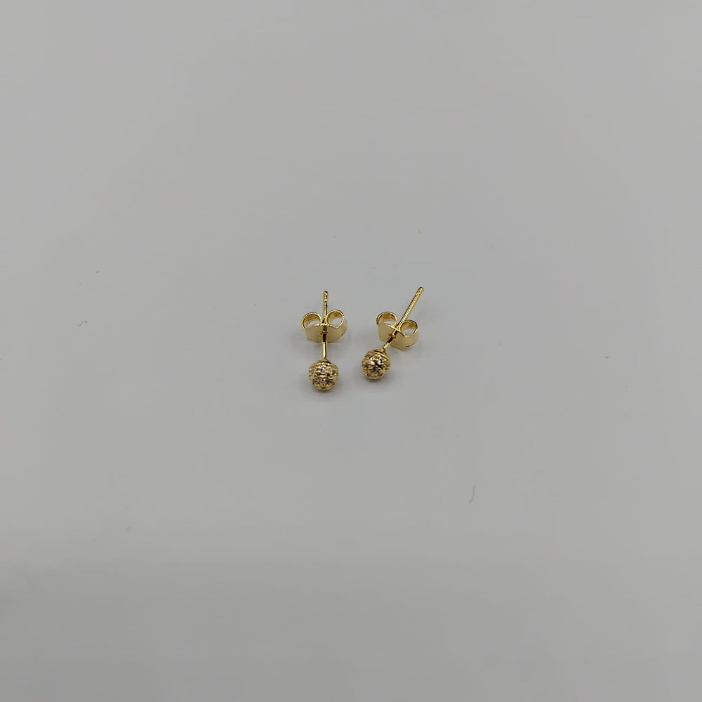 Topos Chispa · Bola de fuego en oro laminado