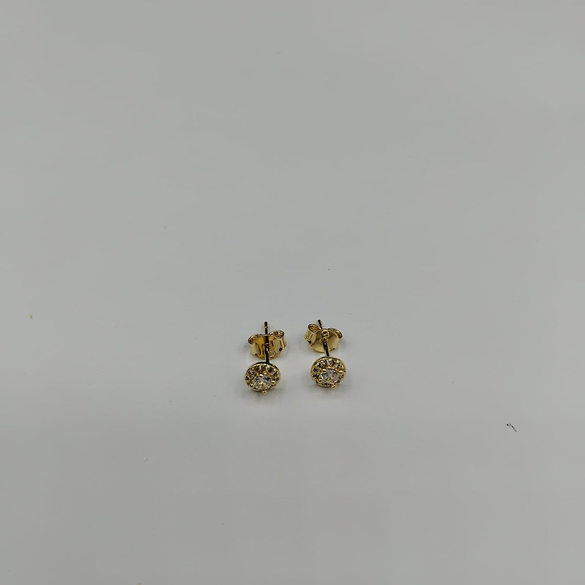 Topos Destello · Oro laminado con circón