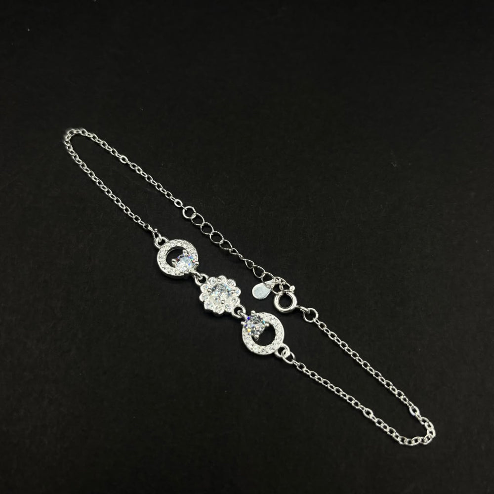 Pulsera Flor y Halo · Plata 925 con circones