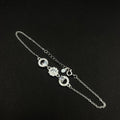 Pulsera Flor y Halo · Plata 925 con circones