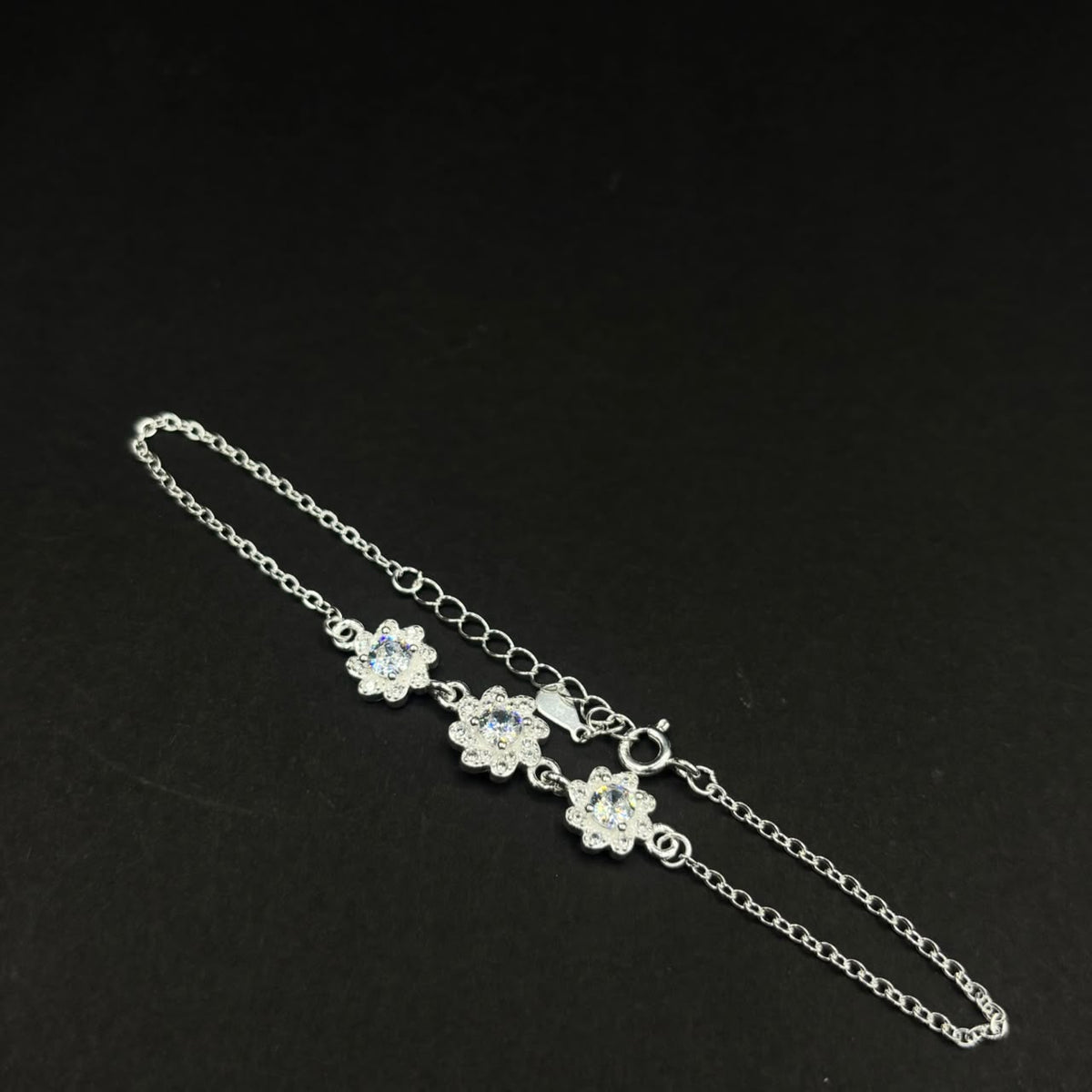 Pulsera Tres Flores Brillo · Plata 925 con circones
