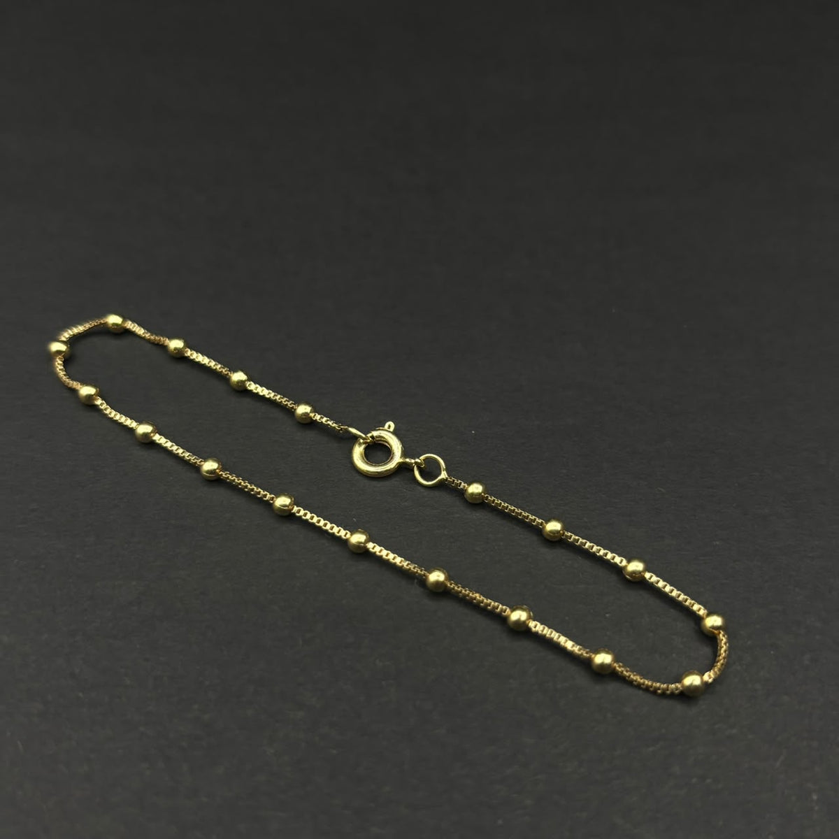 Pulsera Militar Balines · Oro laminado, 20 cm
