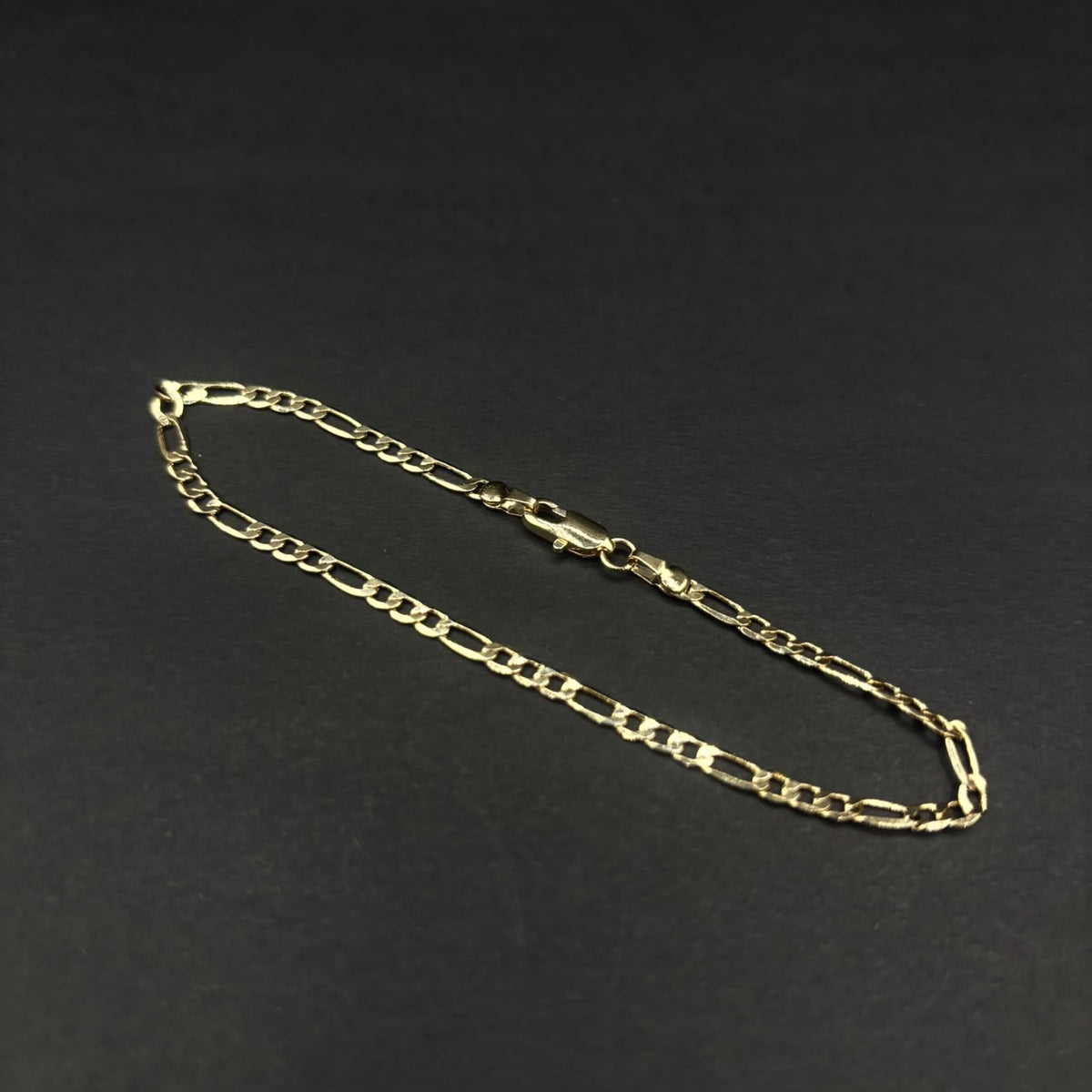 Pulsera Fígaro Roma · Oro laminado, 2,3 mm