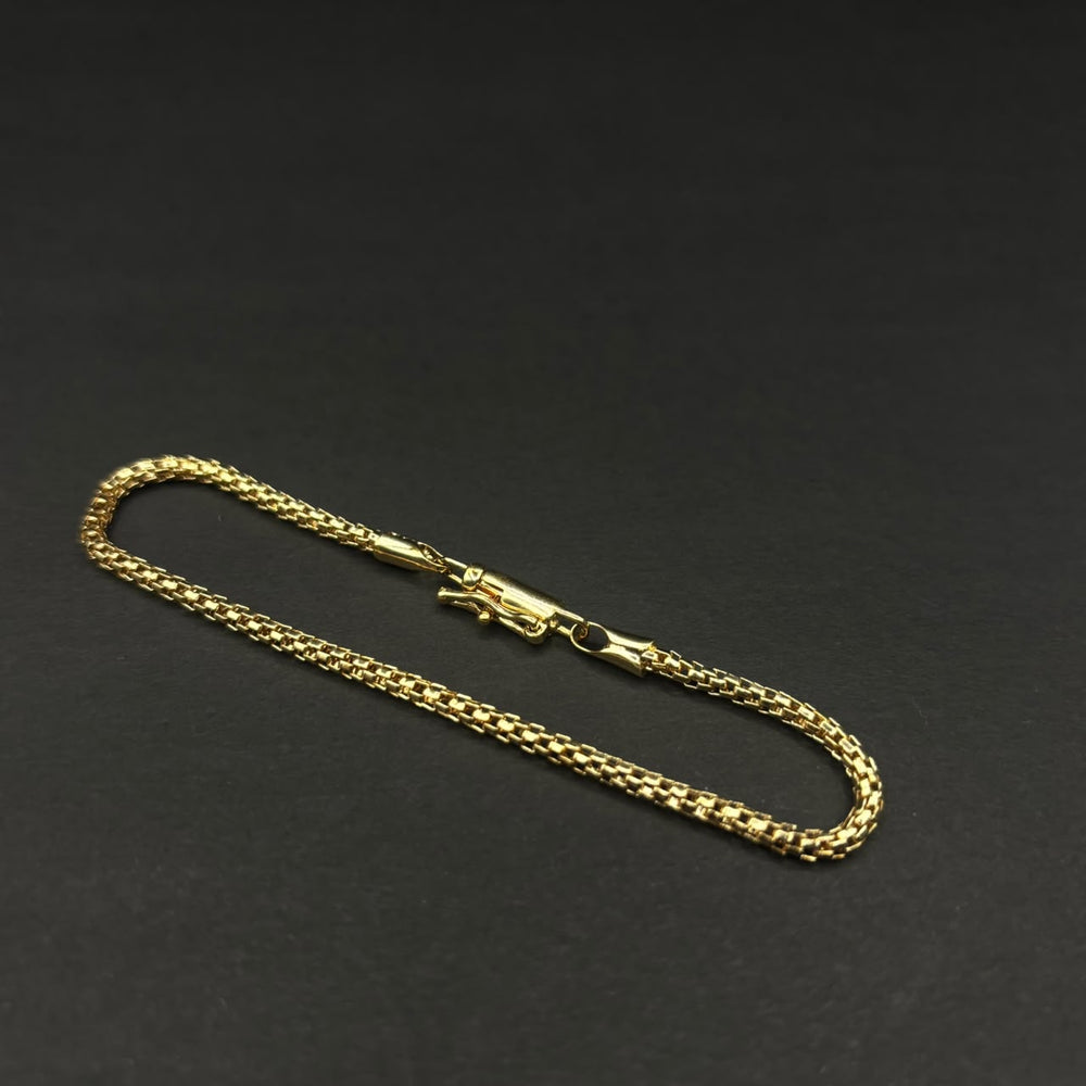 Pulsera Lazo Sevilla · Oro laminado con broche de seguridad