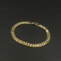 Pulsera Aurora · Oro laminado, 18 cm · 5,4 mm