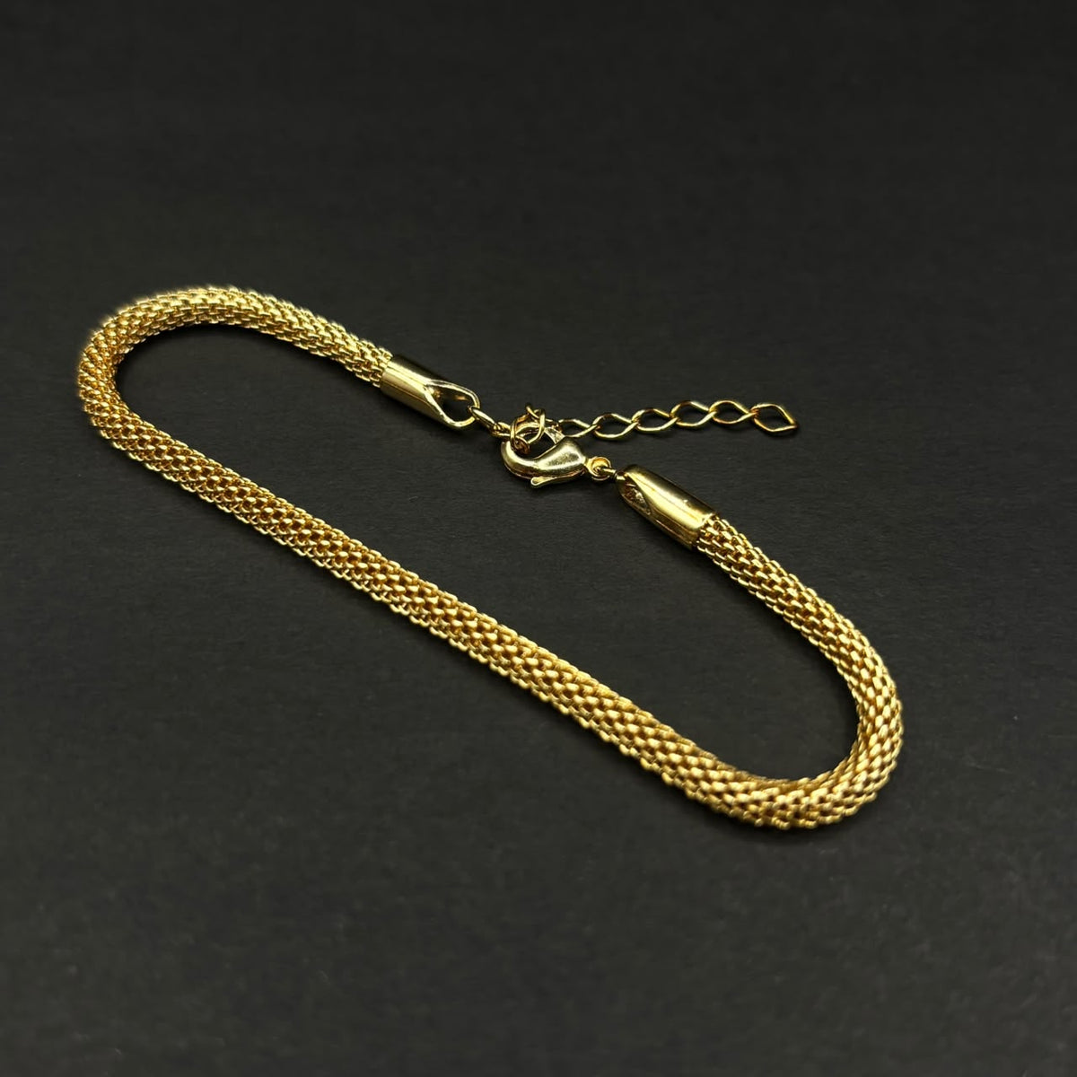 Pulsera Lazo Malla · Oro laminado, 21 cm